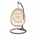 Fauteuil suspendu œuf avec support acier noir résine tressée PE beige et coussins polyester 105 x 105 x 195 cm